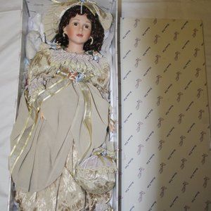 Vintage Doll with cream satin dress